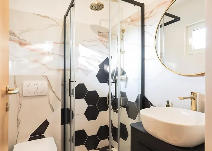 Апартаменты Della *